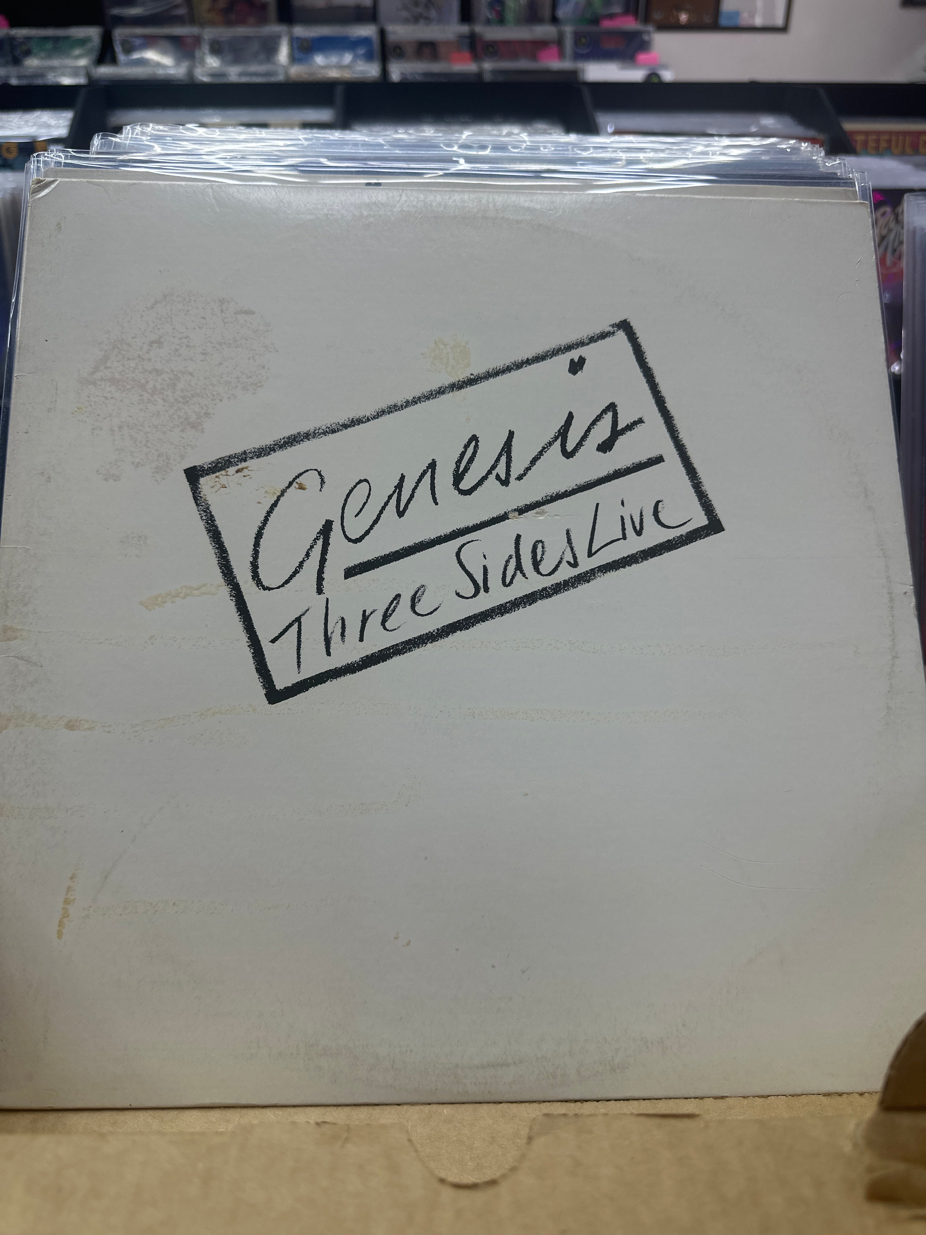 GENESIS - THREE SIDES LIVE